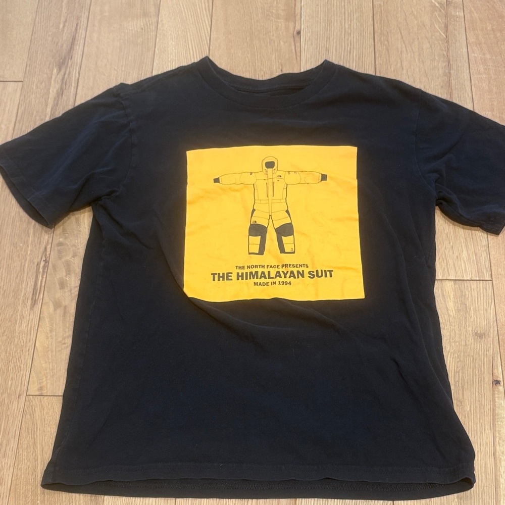 The North Face Black Tee with Yellow Himalayan Graphic